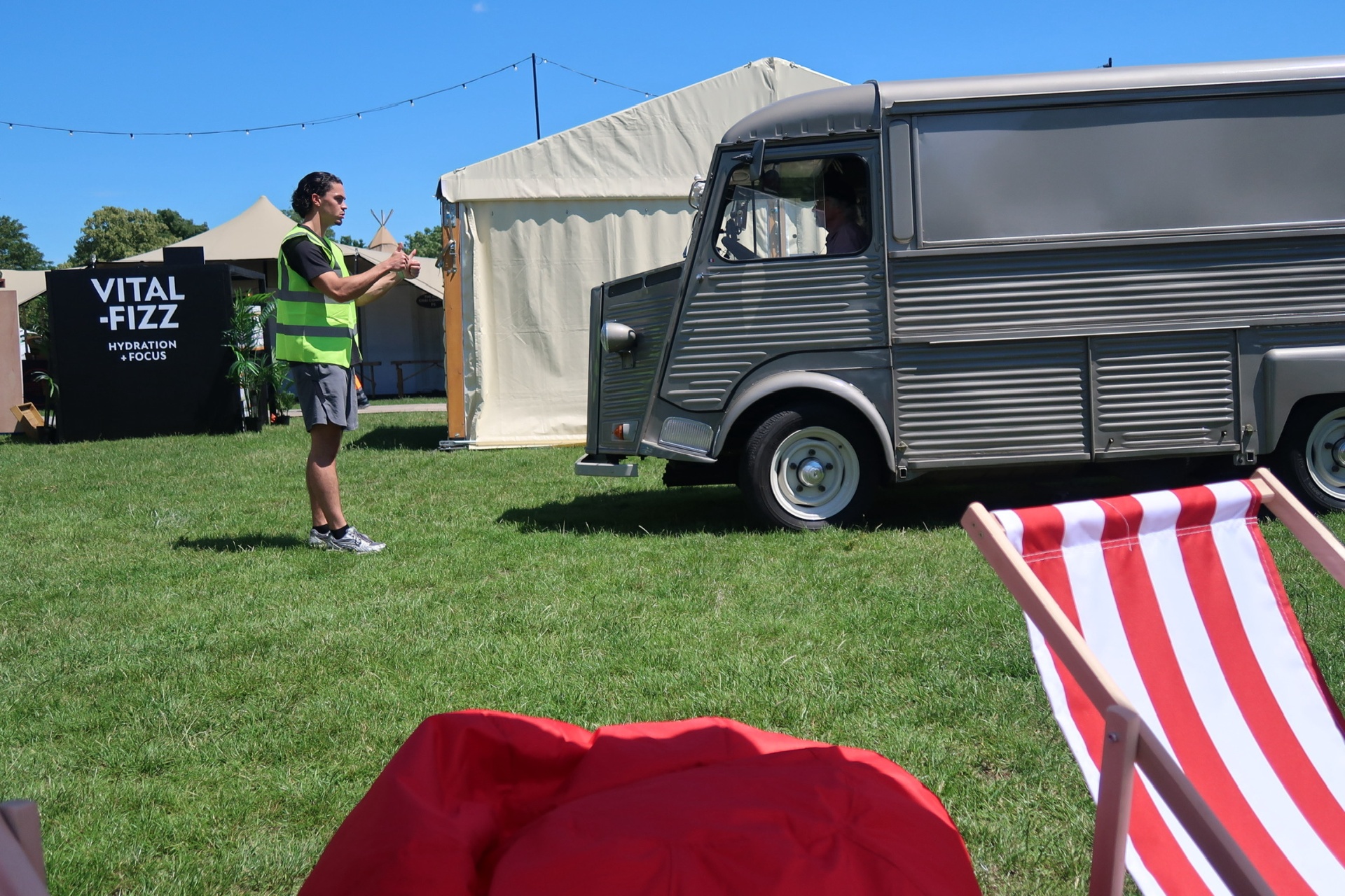 The Daiquiri Club vintage van set up at a festival